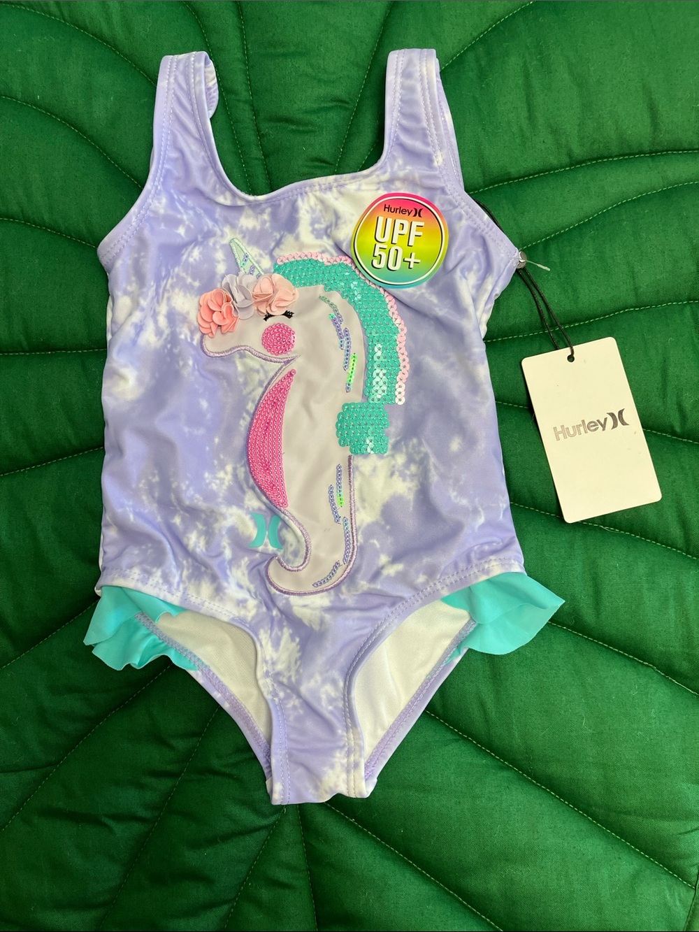 NWT Hurley little girls one piece purple seahorse unicorn swimsuit. Size 2T.